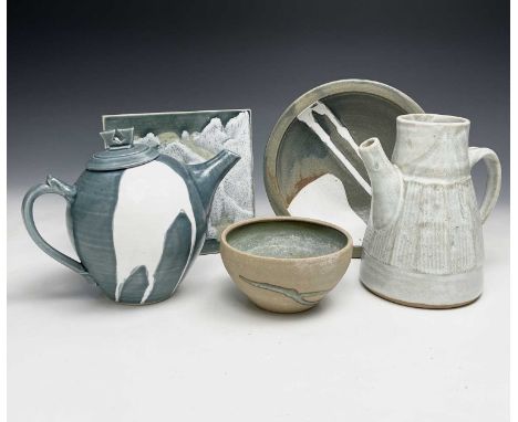 A collection of Alan Brough studio pottery comprising a teapot, height 16cm, a coffee pot (no lid) two bowls, and a decorativ