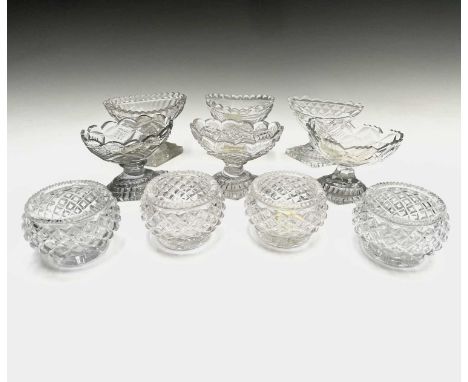 Six assorted Georgian and later navette shape cut glass salts, each approximately 8cm high, and a set of four circular cut gl