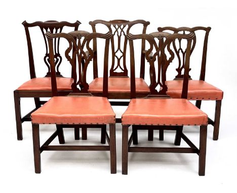 A matched group of five 19th century mahogany dining chairs in the Chippendale taste, including one carver.Provenance:Michael