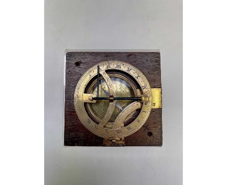A brass equinoctial compass sundial, 19th century, with folding blued steel gnomon in a mahogany case with lift-off lid, 8.5c