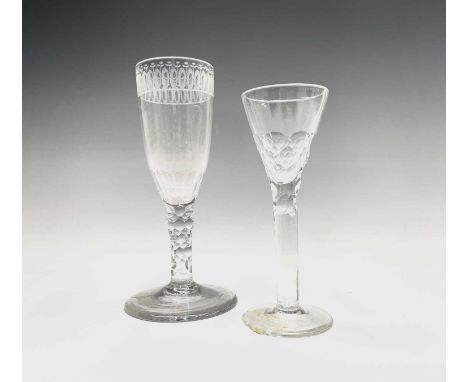 A George III ale flute, with etched and engraved bowl, on a faceted stem, height 15.7cm, together with a small cordial glass 