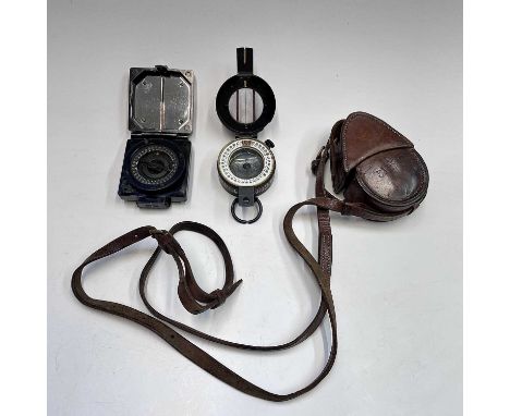 A WWII marching compass, the lacquered case stamped T.G.Co Ltd, No B312840, 1945 MkIII (For The Gramophone Company, made by F
