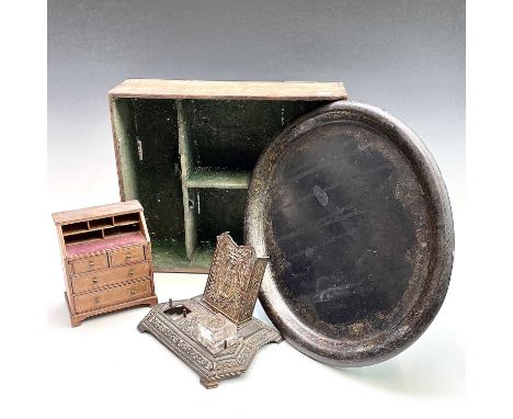 A Victorian papier mache lacquered oval tray, width 44cm, together with an oak cutlery box, an inkstand and a miniature burea