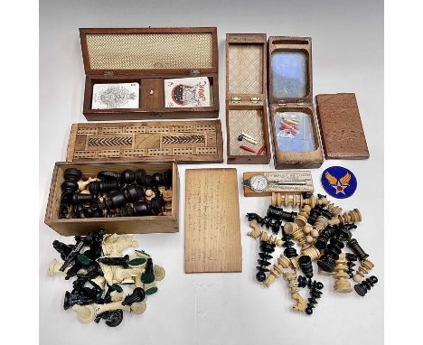 A Victorian inlaid cribbage box, two further boxes, a crib board, three part chess sets etc (box).Provenance:Michael Trethewe