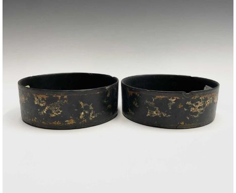 A pair of Regency black lacquered circular coasters, with gilt decoration, diameter 14cm.Provenance:Michael Trethewey. A Gent