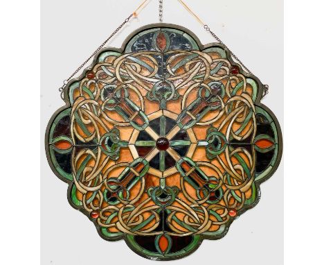 A MeydaTiffany amber and marbled green stained glass panel set within a bronzed surround signed Copyright Meyda Tiffany. Widt