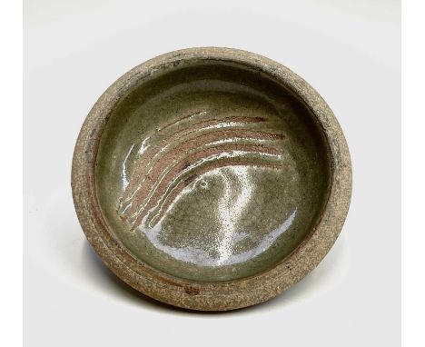 A Leach studio pottery small dish, with incised decoration, diameter 11.5cm.