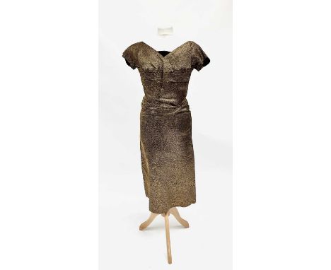 A circa 1950s 'Wishick &amp; Webber Model' short-sleeved mid-length gold dress with black velvet bow detail, approximate size