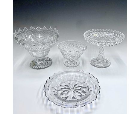 A Georgian cut glass bowl with a foliate raised border and slice cut tapered body, height 22.5cm, together with a 19th centur