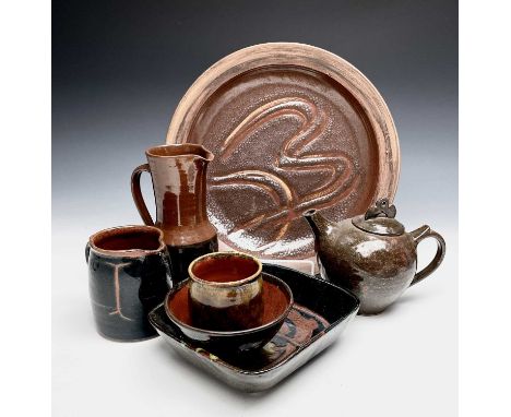 A collection of Alan Brough studio pottery comprising a charger, signed with initials, inscribed 'PZ' and dated (19)99, 33cm 
