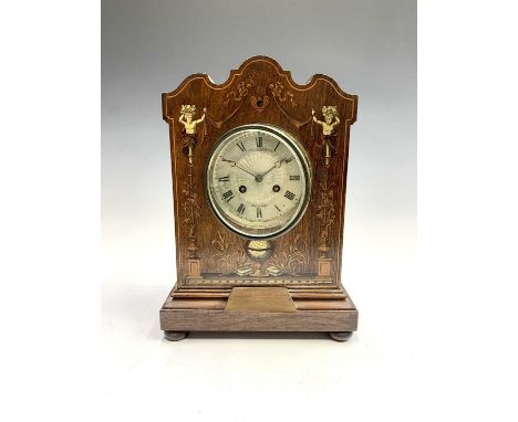 A French rosewood and inlaid mantel clock, early 20th century, retailed by Arnold &amp; Lewis, Manchester, height 35cm.