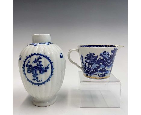 A Worcester blue and white porcelain cream jug, late 18th century, printed with a Willow pattern, pseudo-oriental mark, heigh