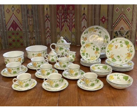 An extensive Villeroy &amp; Boch ‘Geranium’ pattern part service, comprising teapot and cover, twin handles sugar bowl and co