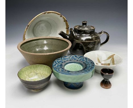 Seven studio pottery wares including a Winchcombe Pottery teapot.