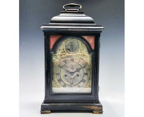 A mid 18th century ebonised bracket clock, the arched dial signed Thos Colley, with twin fusee movement, striking on a bell, 