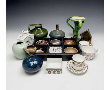 An Eastern green pottery candlestick with three outswept tendrils, height 18cm, together with other assorted ceramics. A box.