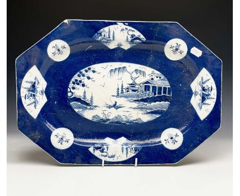 A Bow powder blue meat platter, circa 1760, painted with Chinoiserie reserves, width 43.5cm.Provenance:Michael Trethewey. A G