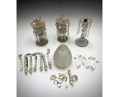 A Victorian cut glass lustre candlestick, on circular foot, height 18.5cm, together with a pair of lustre candlesticks and a 