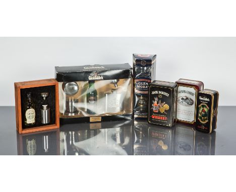 SELECTION OF MINIATURE GIFT PACKS
Glenfiddich 12 y/o, with hip flask, funnel and telescopic cup. Jack Daniels twin pack tin, 