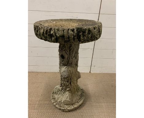A bird bath in the form of a tree trunk (H68cm)