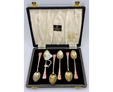A boxed set of pink enamel and silver spoons, hallmarked for Birmingham 1949 
