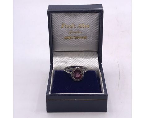 A Platinum Spinel and Diamond ring (Approx 2 to 2.5cts)