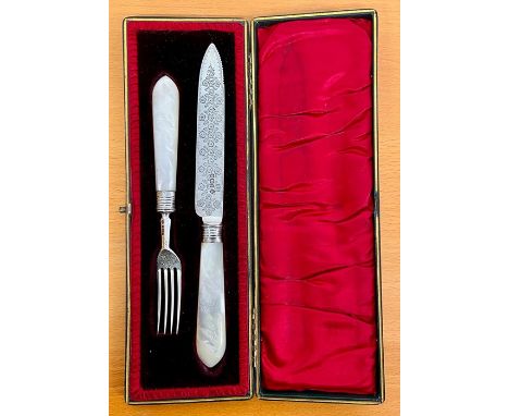 A Mother of Pearl handled knife and fork, dated Sheffield, RMEH