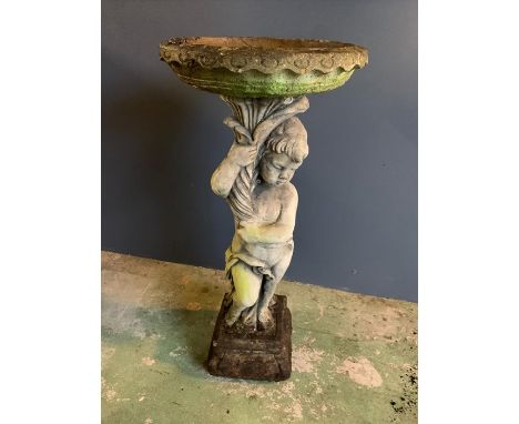 A reclaimed cherub bird bath, holding up the water basin (H92cm)