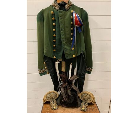 An Early 19th century Kings bodyguard for Scotland court dress for a gentleman. comprising of green cloth coatee with a bicor