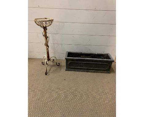 A white painted wrought iron flower pot stand and small planter 