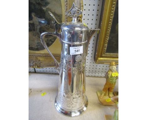 A WMF claret jug with embossed decoration in the Art Nouveau style, height 14ins