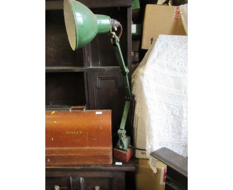 An angle poise lamp