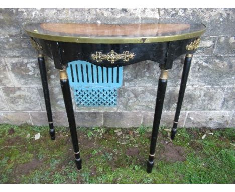 A painted console table, with inlay decoration and applied metal mount, one leg broken, width 37ins x depth 16.5ins&nbsp;