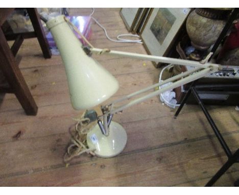 An angle poise lamp