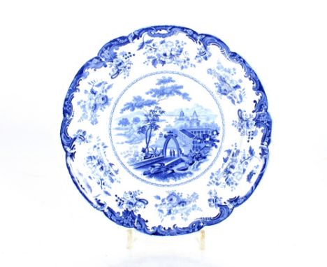Eleven 19th Century opaque china Chinese marine pattern dinner plates; a smaller plate; and a sauce tureen and ladle