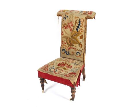A Victorian Prie Dieu chair with tapestry upholstered seat and back