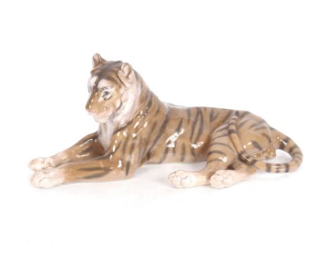 A Royal Copenhagen figure of a recumbent tiger, 31cm long&nbsp;