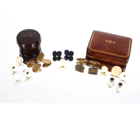 A pair of 9ct gold cuff-links having engine turned decoration, 7.6gms; and various other base metal cuff-links, studs etc.