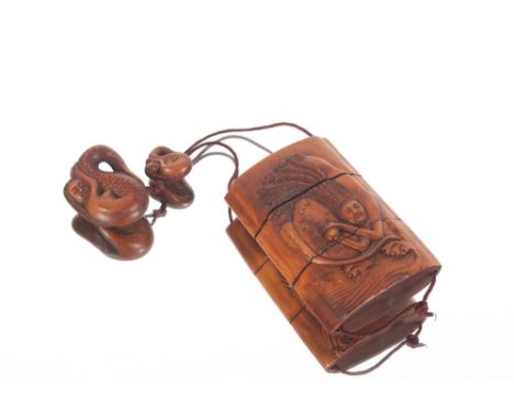 A Japanese carved wooden Inro, Netsuke and Ojime in three sections decorated in relief with mermaids and seaweed, character m