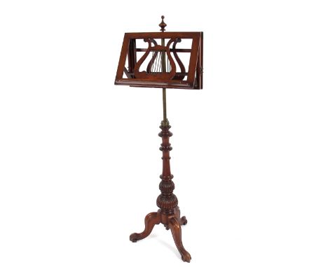 A Victorian mahogany adjustable music stand, raised on a turned fluted column and tripod base, 142cm high&nbsp;