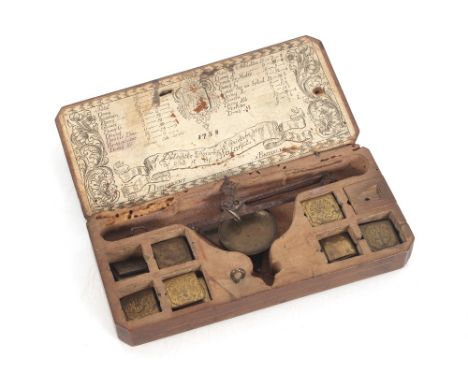 A rare set of 18th Century boxed Belgian scales and weights, bearing paper label, dated 1758, 15cm long  AF 