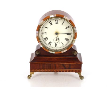 A late 19th Century rosewood and inlaid drum shaped mantel alarm clock, raised on claw and ball feet, 18cm high&nbsp;