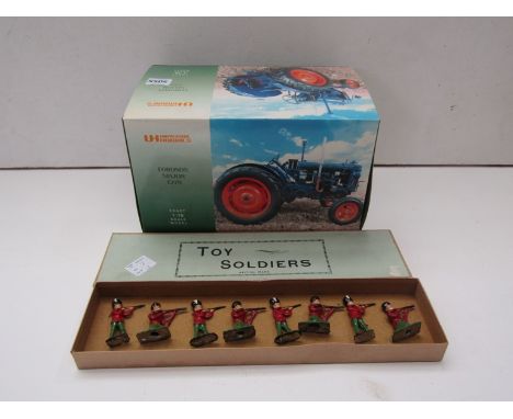 Boxed Universa Hobbies 1:16 scale Fordson Major E27N. with a set of  "Toy Soldiers" lead Scots Guards - in cabinet 