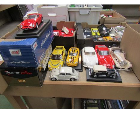 Eight large scale diecast cars including Burago and two boxed examples 