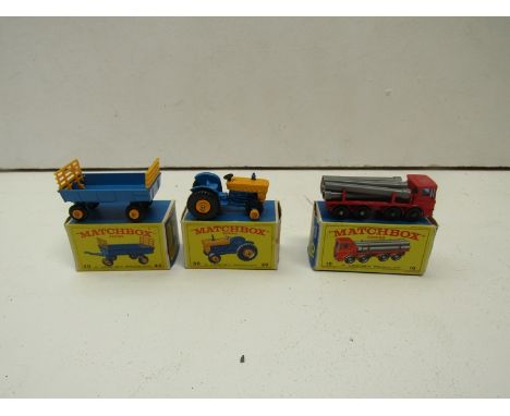 Three boxed Matchbox Series diecast vehicles, 39 Ford Tractor, 40 Hay Trailer and 10 pipe truck 