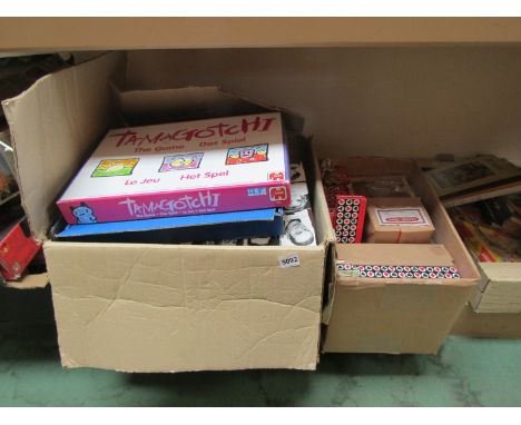 A collection of vintage board games and cribbage sets 