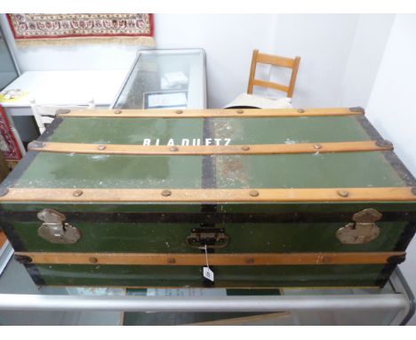 Steel strapped and banded cabin trunk