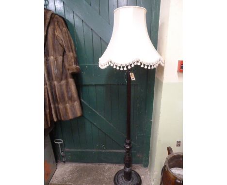 Carved fluted mahogany standard lamp