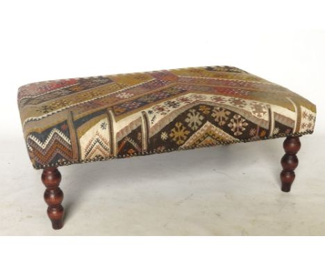 A rectangular stool, upholstered in the Kelim style, trade only, 37ins x 24ins 