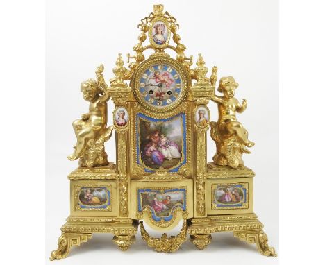 A 19th century ormolu and Sevres mantel clock, the back plate inscribed Japy Freres, the panels decorated with figures in lan